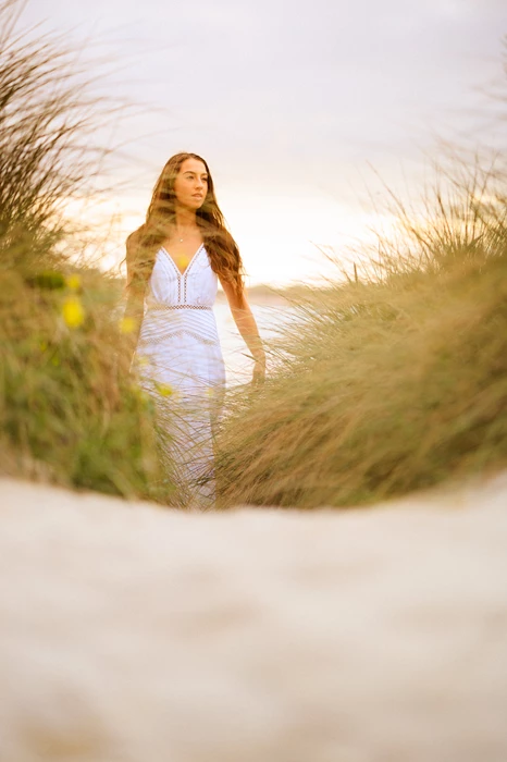 Colour photo of a person in a dress