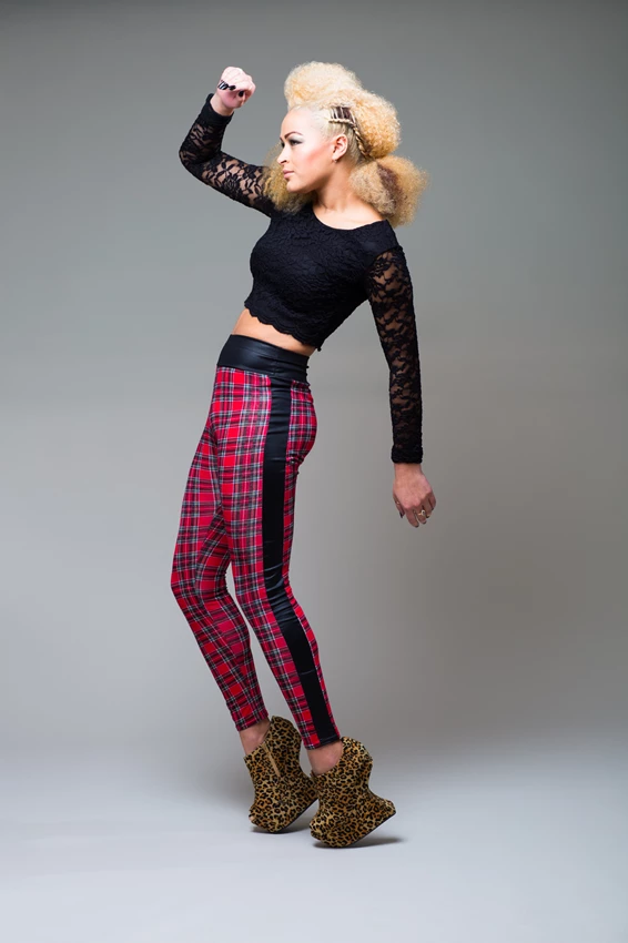 Stylish fashion photo of young woman against grey background